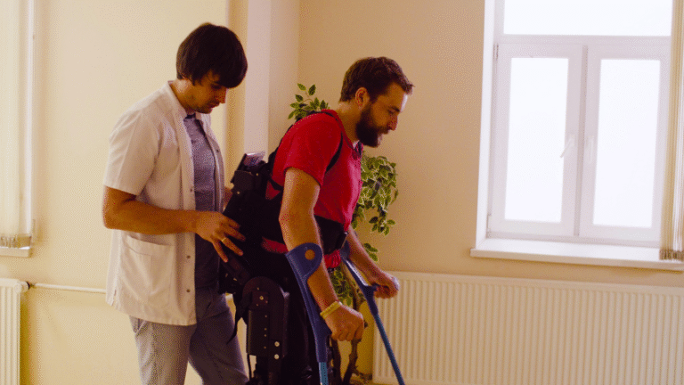 Exoskeleton helping a human to walk